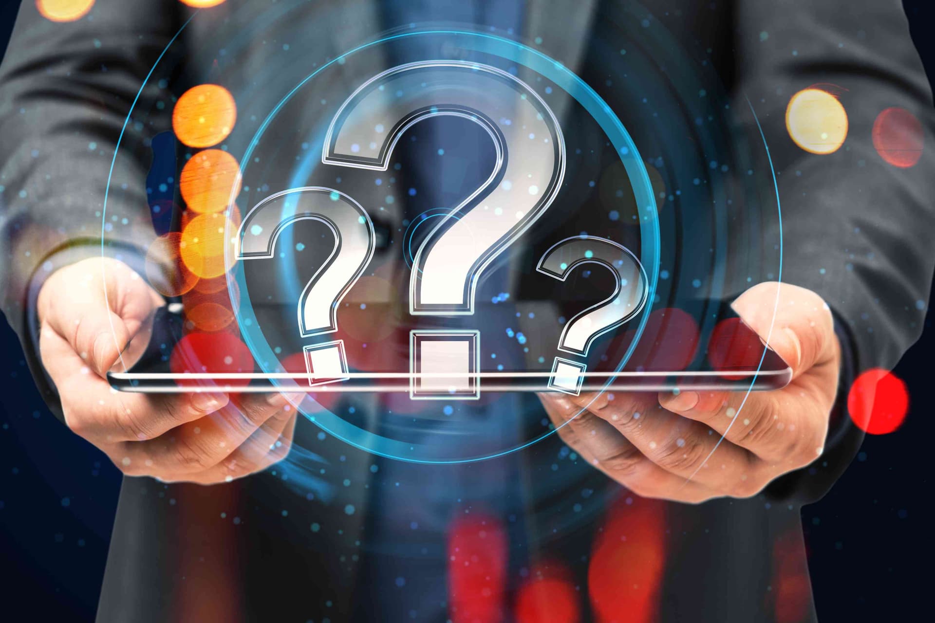 Dynamics Monk professional holding tablet with question marks, highlighting why faster financial close alone fails to drive smarter Dynamics 365 decision-making.
